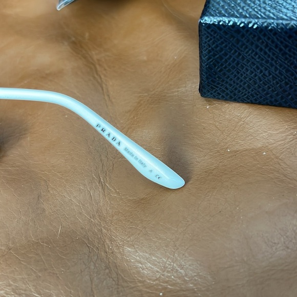 Prada | Catwalk PR 74VS Sunglasses by Prada™. Cat-Eye / Silver, Semi Rimless. - Picture 11 of 11